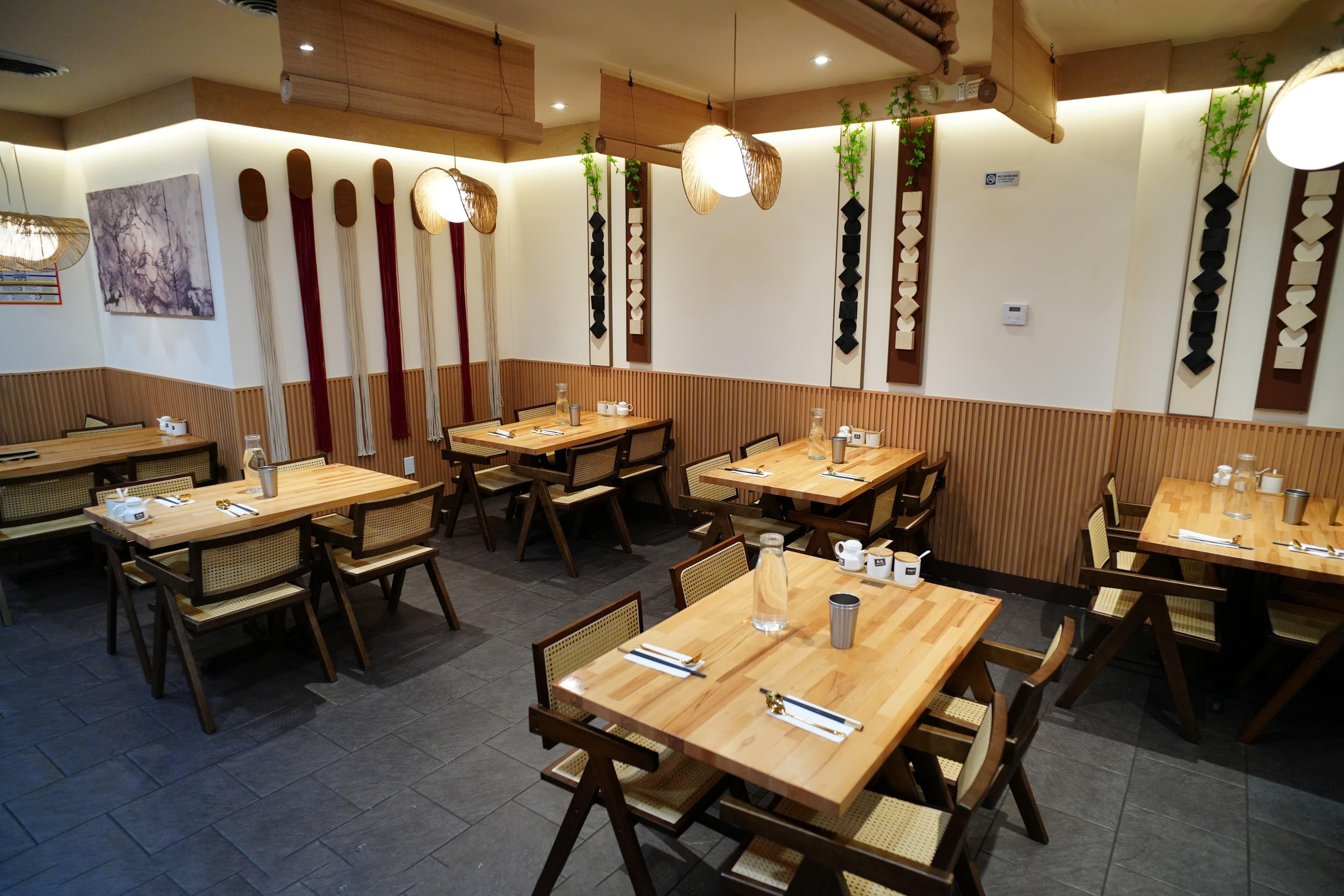 Contemporary restaurant dining room with floor-to-ceiling windows, natural light, clean lines, luxury seating, urban sophistication