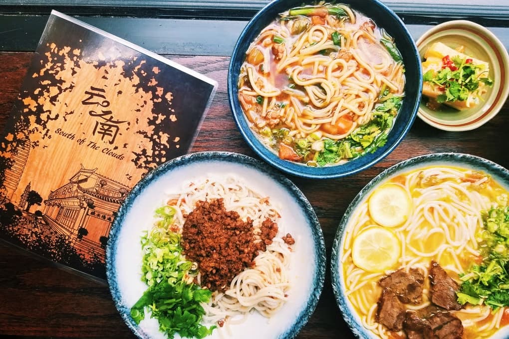 Elegant restaurant award ceremony moment, chef receiving recognition, professional photography, warm lighting, celebration atmosphere